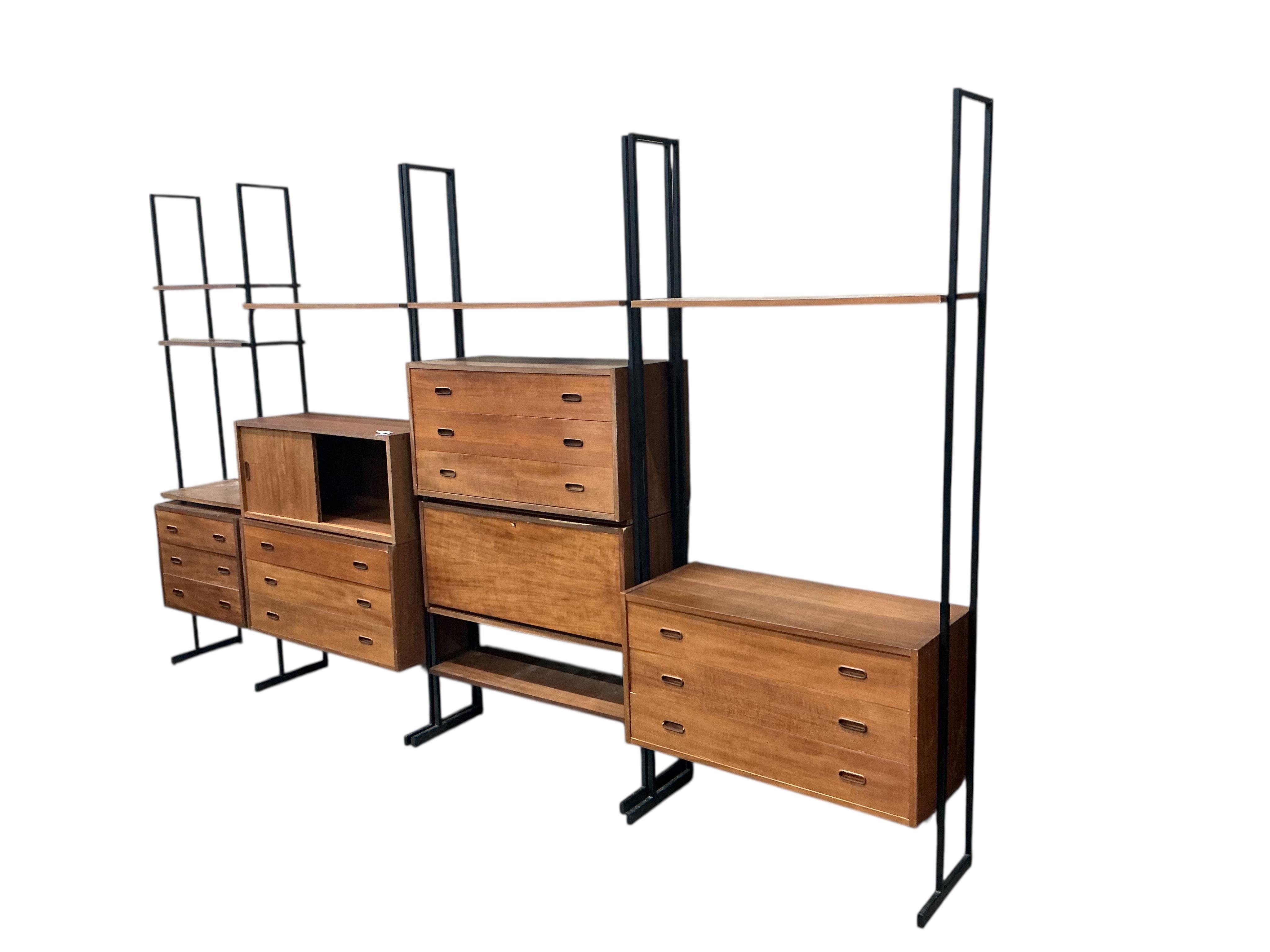 A mid century teak Ladderax type wall unit, width 341cm, depth 40cm, height 203cm